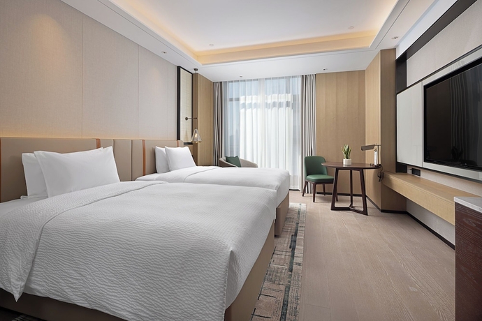 Imagen de la habitación del Hotel Wanda Yi Wuhan. Foto 10