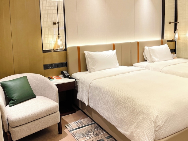 Imagen de la habitación del Hotel Wanda Yi Wuhan. Foto 11