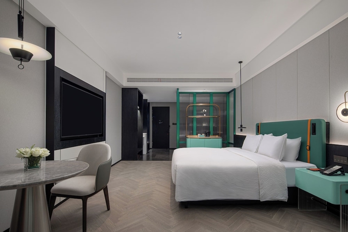Imagen de la habitación del Hotel Wanda Yi Yangxin. Foto 3