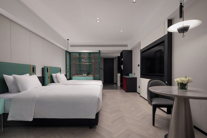 Imagen de la habitación del Hotel Wanda Yi Yangxin. Foto 4