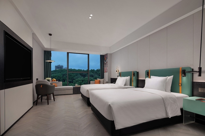Imagen de la habitación del Hotel Wanda Yi Yangxin. Foto 9