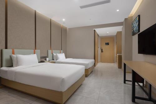Imagen de la habitación del Hotel Wanda Yue Suzhou Huangdai. Foto 18
