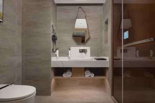 Imagen de la habitación del Hotel Wanda Yue Suzhou Huangdai. Foto 19