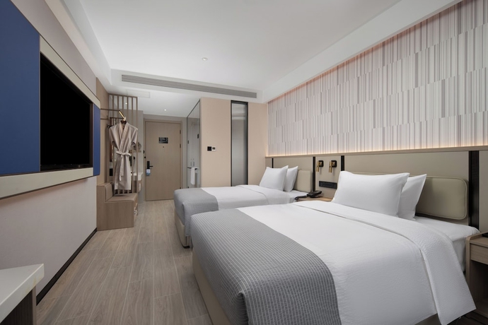 Imagen de la habitación del Hotel Wanda Yuehua Tangshan North. Foto 3
