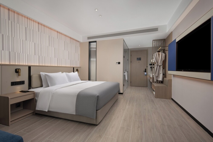 Imagen de la habitación del Hotel Wanda Yuehua Tangshan North. Foto 4