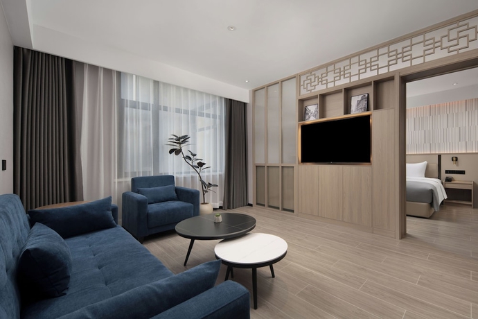 Imagen de la habitación del Hotel Wanda Yuehua Tangshan North. Foto 6
