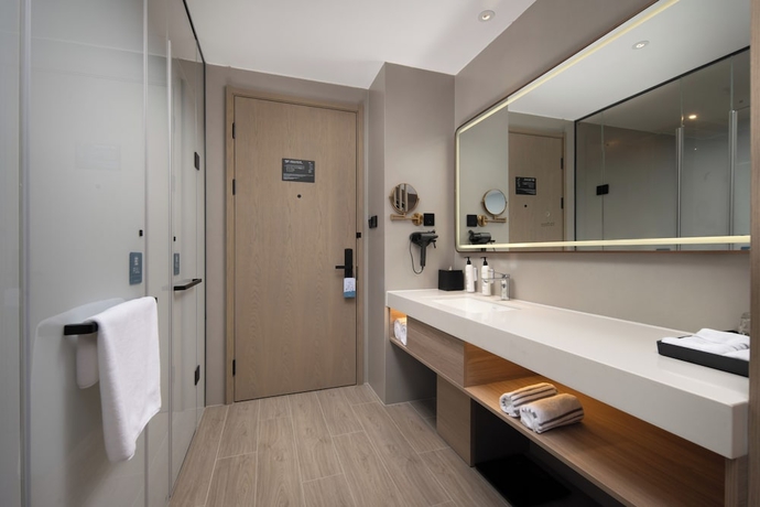 Imagen de la habitación del Hotel Wanda Yuehua Tangshan North. Foto 10