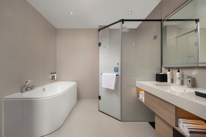 Imagen de la habitación del Hotel Wanda Yuehua Tangshan North. Foto 11