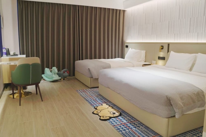 Imagen de la habitación del Hotel Wanda Yuehua Tangshan North. Foto 13