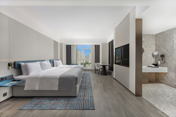 Imagen de la habitación del Hotel Wanda Yuehua Urumqi Railway. Foto 4