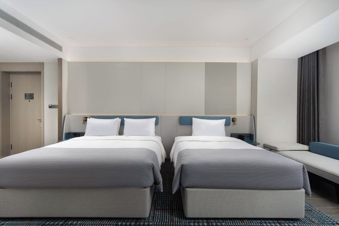 Imagen de la habitación del Hotel Wanda Yuehua Urumqi Railway. Foto 5