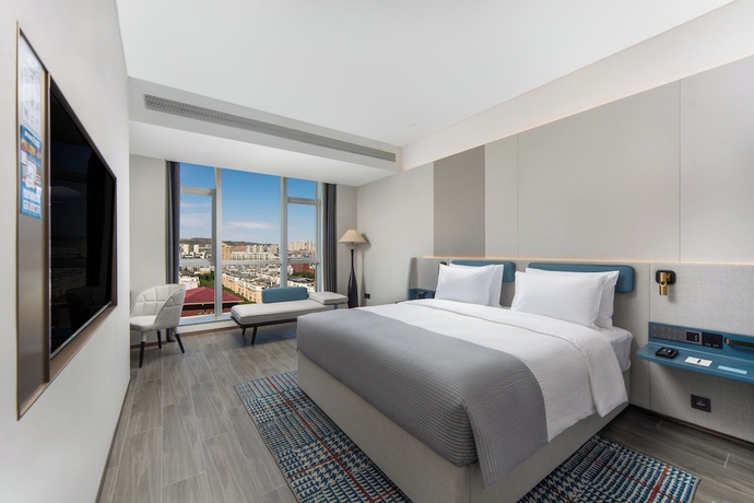 Imagen de la habitación del Hotel Wanda Yuehua Urumqi Railway. Foto 6