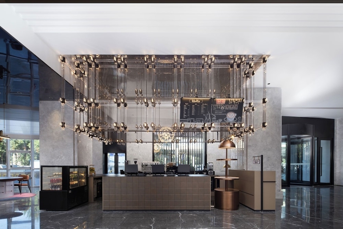 Imagen de los interiores del Hotel Wanda Yuehua Urumqi Railway. Foto 12