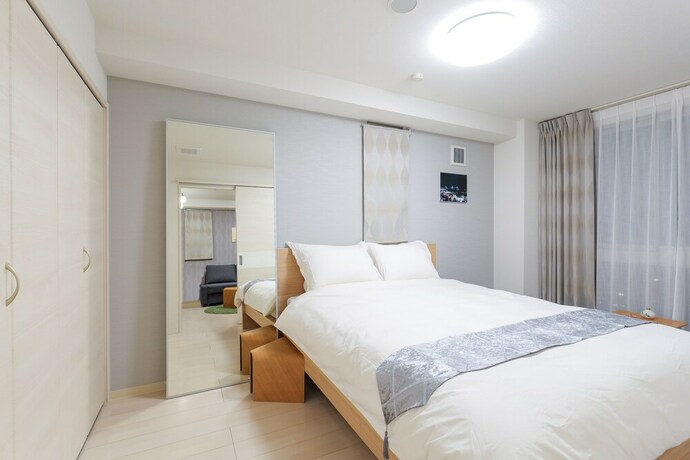 Imagen de la habitación del Hotel Wandm House. Foto 13