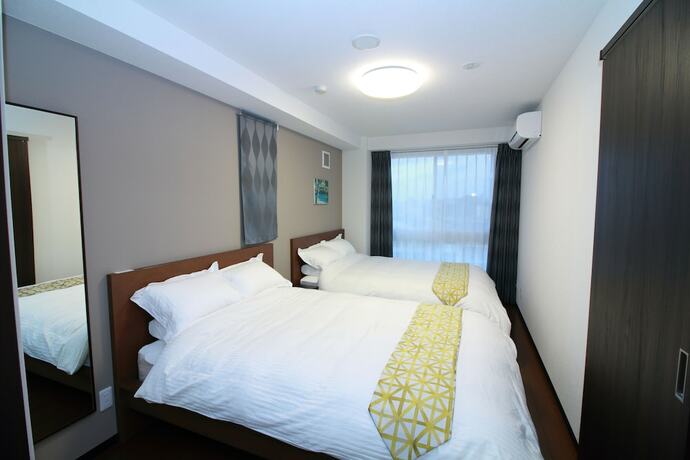 Imagen de la habitación del Hotel Wandm House. Foto 23