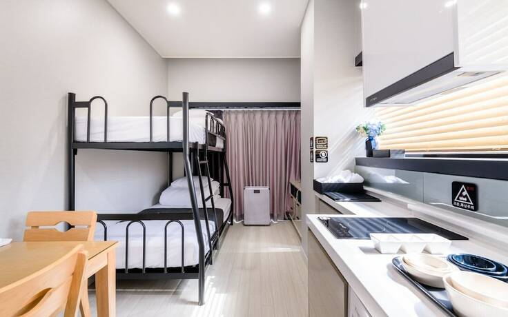 Imagen de la habitación del Hotel Wando Corner Residence. Foto 15