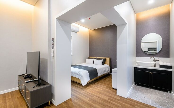 Imagen de la habitación del Hotel Wando Corner Residence. Foto 17