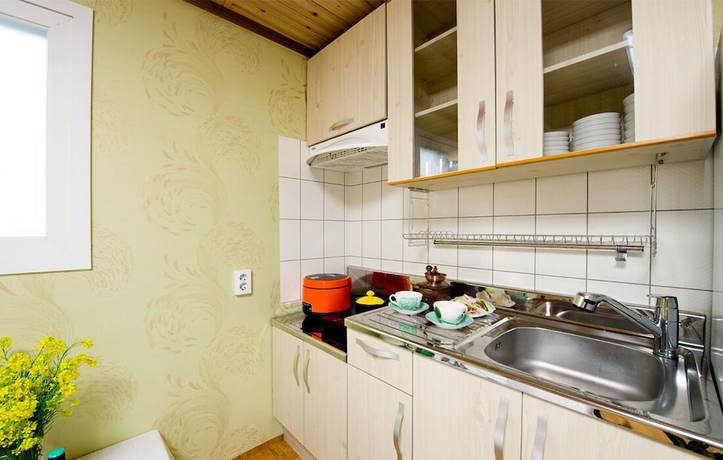 Imagen de la habitación del Hotel Wando Sol Beach Pension. Foto 11