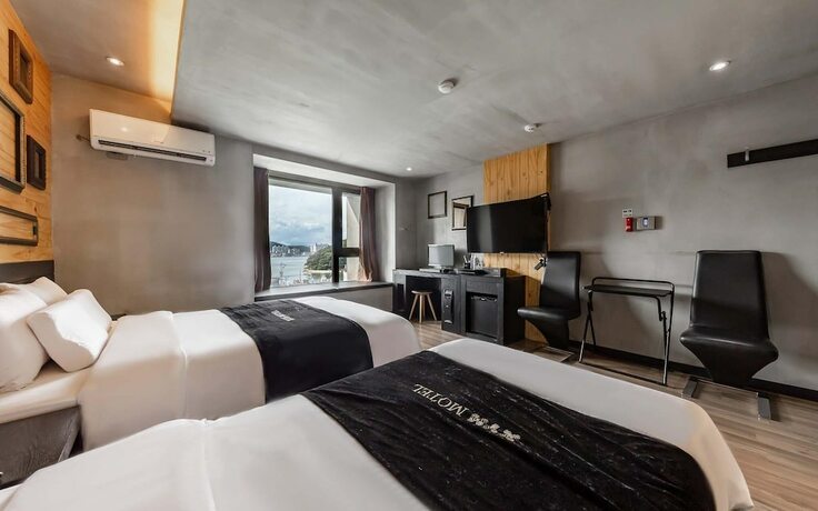 Imagen de la habitación del Hotel Wando XYM. Foto 19