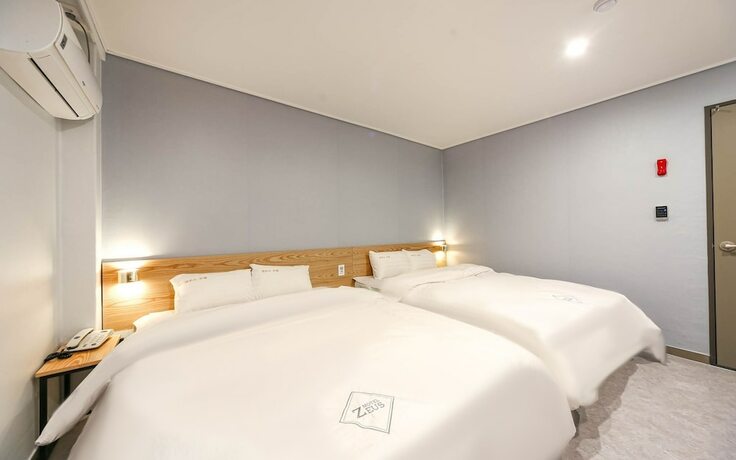 Imagen de la habitación del Hotel Wando Zeus. Foto 15