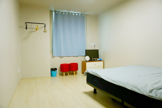 Imagen de la habitación del Hotel Wandonesia. Foto 17