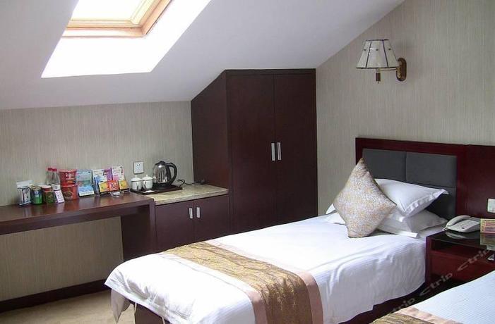 Imagen de la habitación del Hotel WangDao holiday inn in Qiandao Lake. Foto 7