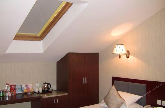 Imagen de la habitación del Hotel WangDao holiday inn in Qiandao Lake. Foto 9