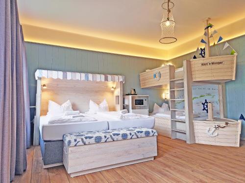 Imagen de la habitación del Hotel Wangerland Resort. Foto 17