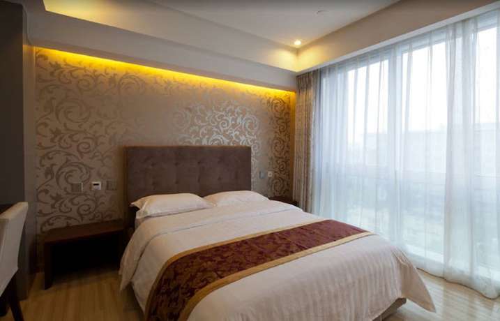 Imagen de la habitación del Hotel Wangfujing Xin Xiang Ya Yuan Apartment. Foto 6