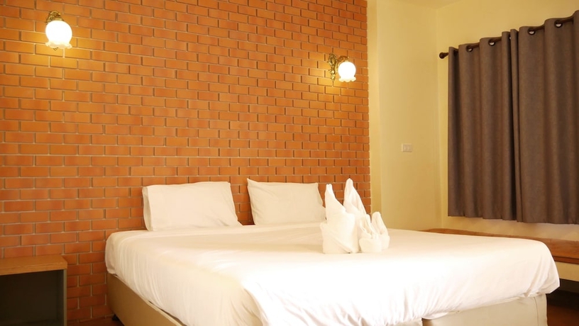Imagen de la habitación del Hotel Wangpla Villa Resort. Foto 12