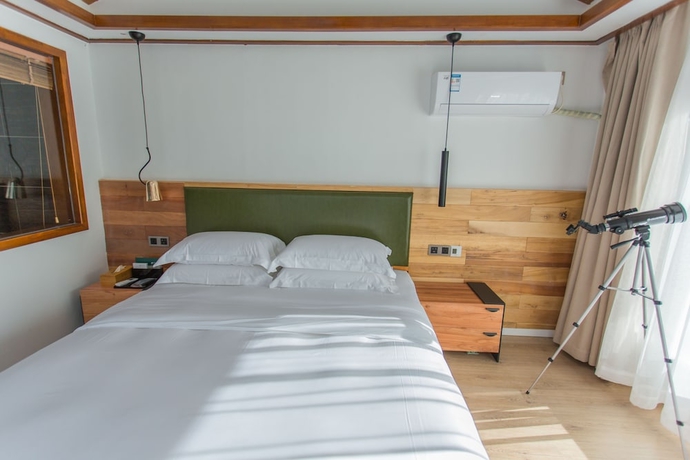 Imagen de la habitación del Hotel Wangshan Travelling With. Foto 5