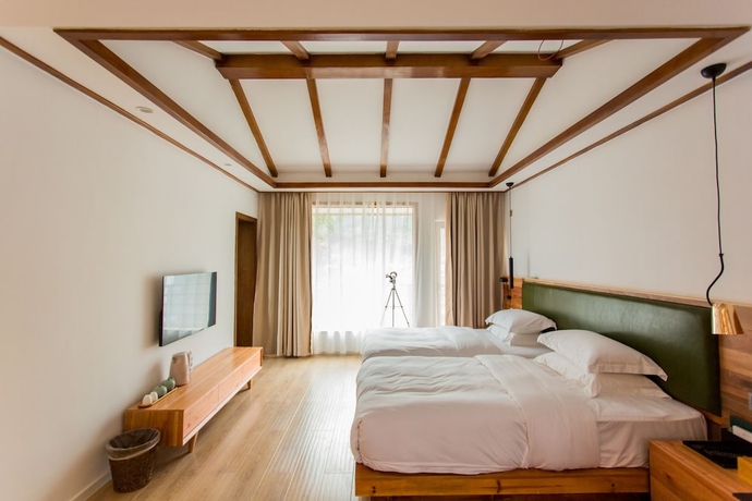 Imagen de la habitación del Hotel Wangshan Travelling With. Foto 9