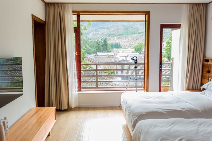 Imagen de la habitación del Hotel Wangshan Travelling With. Foto 10