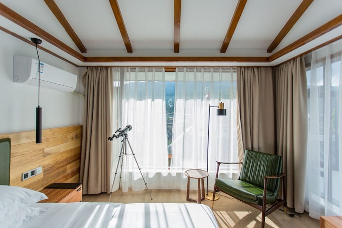 Imagen de la habitación del Hotel Wangshan Travelling With. Foto 15