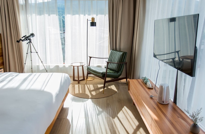 Imagen de la habitación del Hotel Wangshan Travelling With. Foto 16