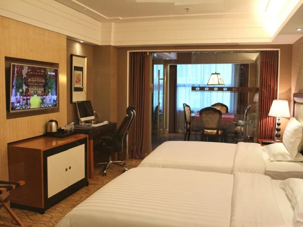 Imagen de la habitación del Hotel Wanhua International. Foto 4