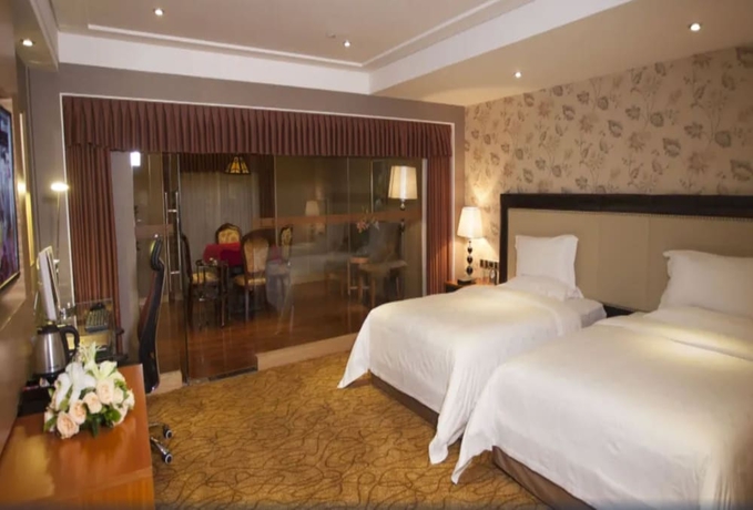 Imagen de la habitación del Hotel Wanhua International. Foto 5