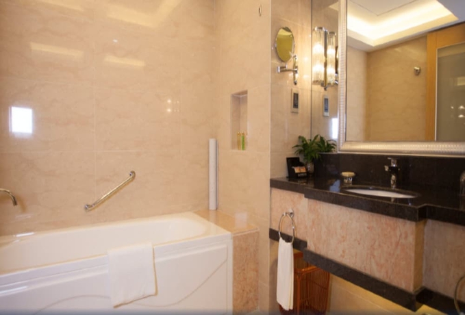 Imagen de la habitación del Hotel Wanhua International. Foto 6