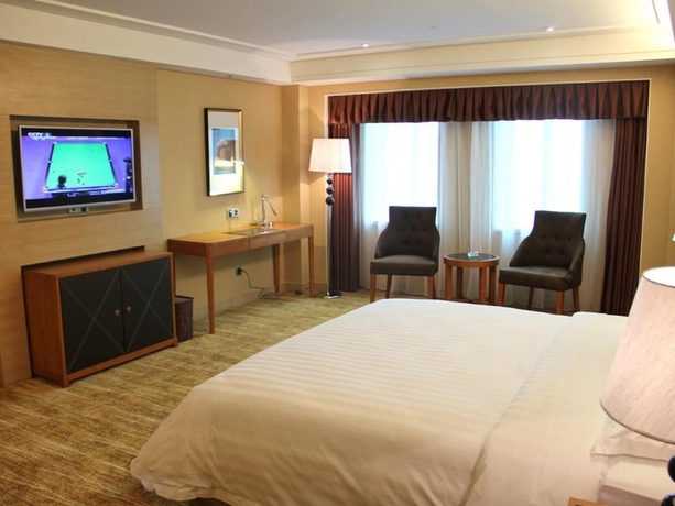 Imagen de la habitación del Hotel Wanhua International. Foto 8