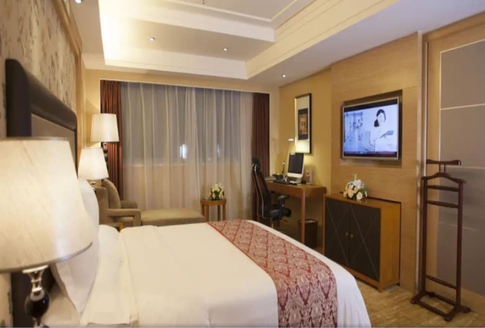 Imagen de la habitación del Hotel Wanhua International. Foto 9