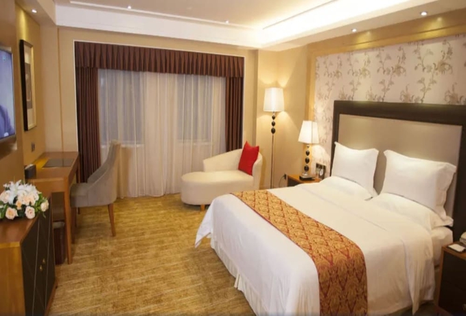 Imagen de la habitación del Hotel Wanhua International. Foto 10
