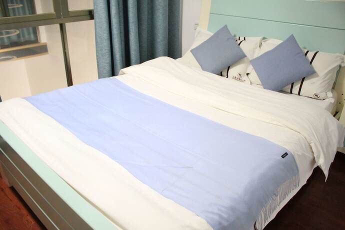 Imagen general del Hotel Wanlong Apartment Xiangxue Branch. Foto 18