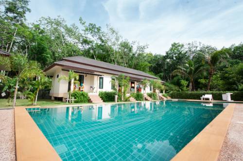 Imagen de la habitación del Hotel Wanna Dream Villas Aonang. Foto 2