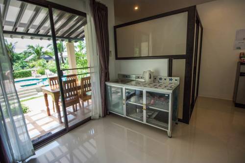Imagen de la habitación del Hotel Wanna Dream Villas Aonang. Foto 8