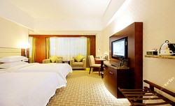 Imagen de la habitación del Hotel Wanny Xinhua Hotel. Foto 3