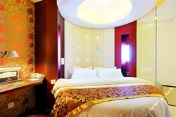 Imagen de la habitación del Hotel Wanny Xinhua Hotel. Foto 4