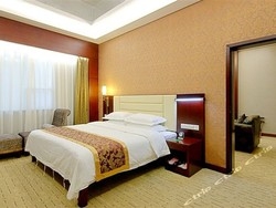 Imagen de la habitación del Hotel Wanny Xinhua Hotel. Foto 5