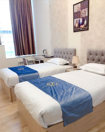 Imagen de la habitación del Hotel Wantong. Foto 7