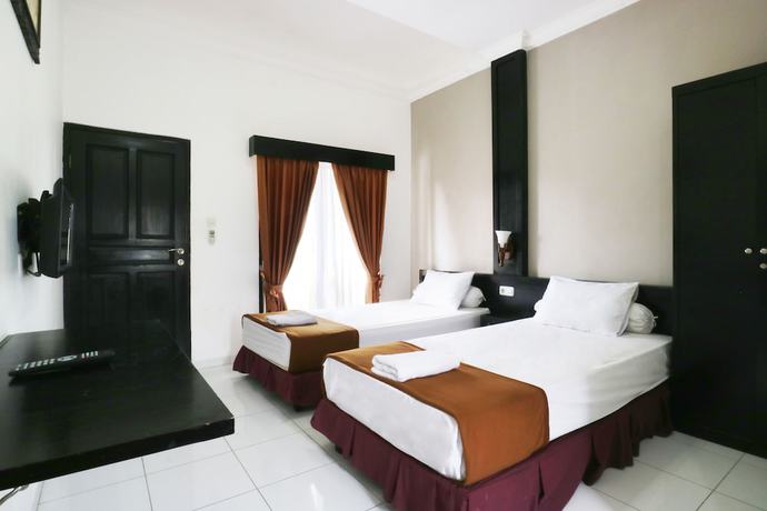 Imagen de la habitación del Hotel Warapsari Inn. Foto 7
