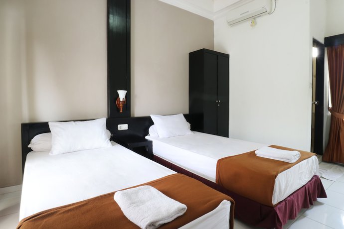 Imagen de la habitación del Hotel Warapsari Inn. Foto 9